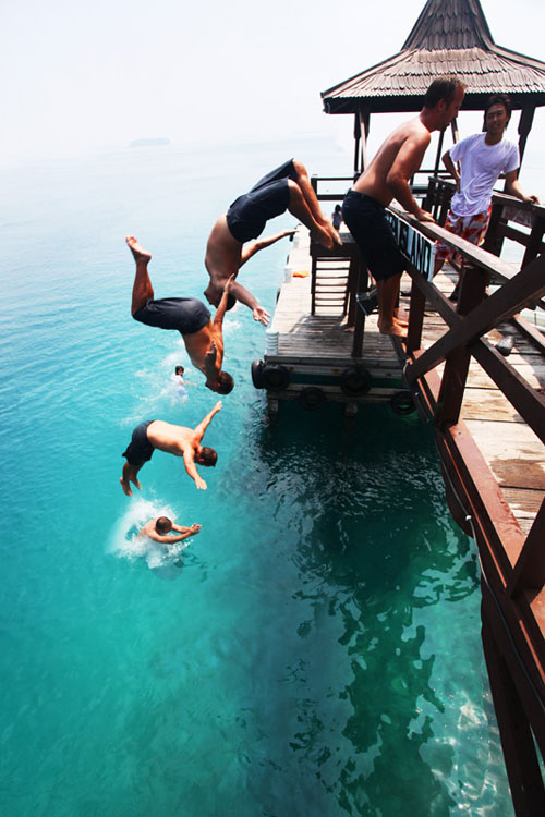 Multiple exposure backflip into the pristine waters of Pulau Seribu 